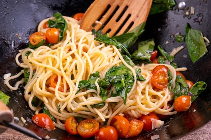 Pasta fresca tossed with spinach